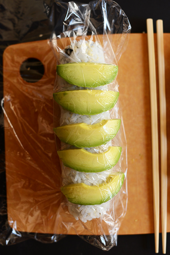 Showing how to roll an Inside Out Sushi Roll without a mat