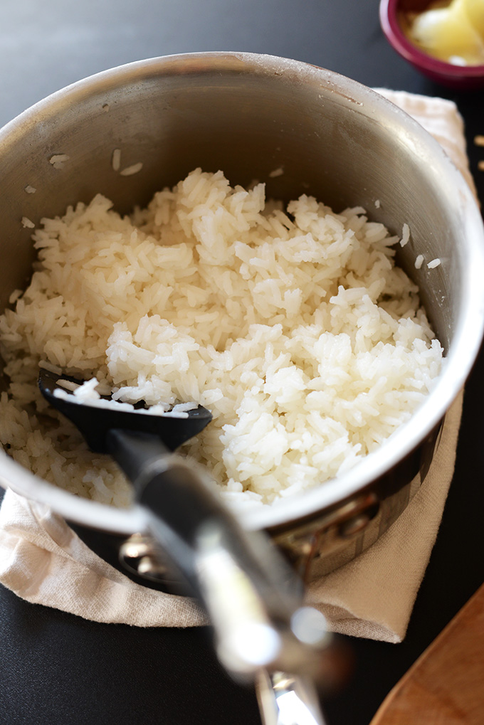 Saucepan filled with freshly cooked homemade sushi rice for our tutorial on How to Make Sushi at Home
